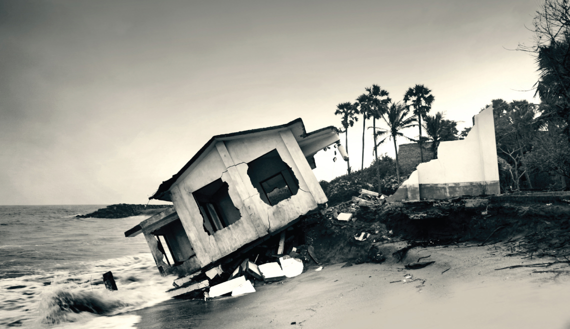 A house in Tamil Nadu after an assault by the sea; cyclones and other extreme weather events are an inevitable consequence of climate change