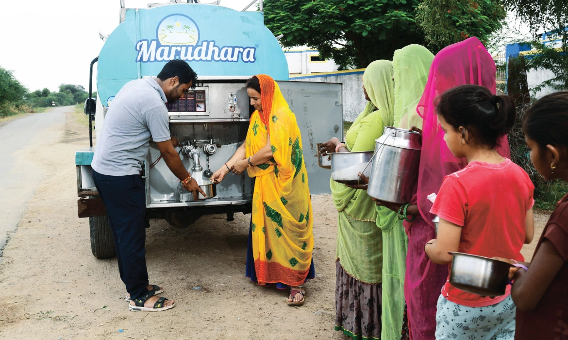 A milk-vending machine of the Asha MPC (Rajasthan) provides fresh milk to village residents