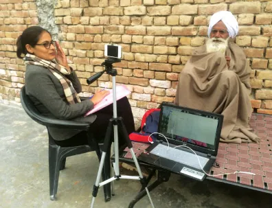 A citizen historian interviewing partition witness Saporan Singh