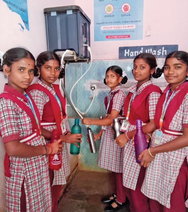 Students of KGBV Kondurg school in Shadnagar in the Ranga Reddy district of Telangana queue up to fill their bottles from a newly-installed water purifier