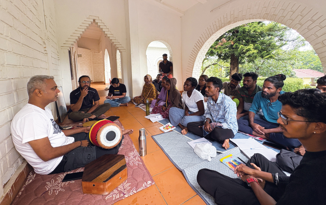 Trainer Vivieck Rajagopalan, a composer and percussion artist, with the fellows