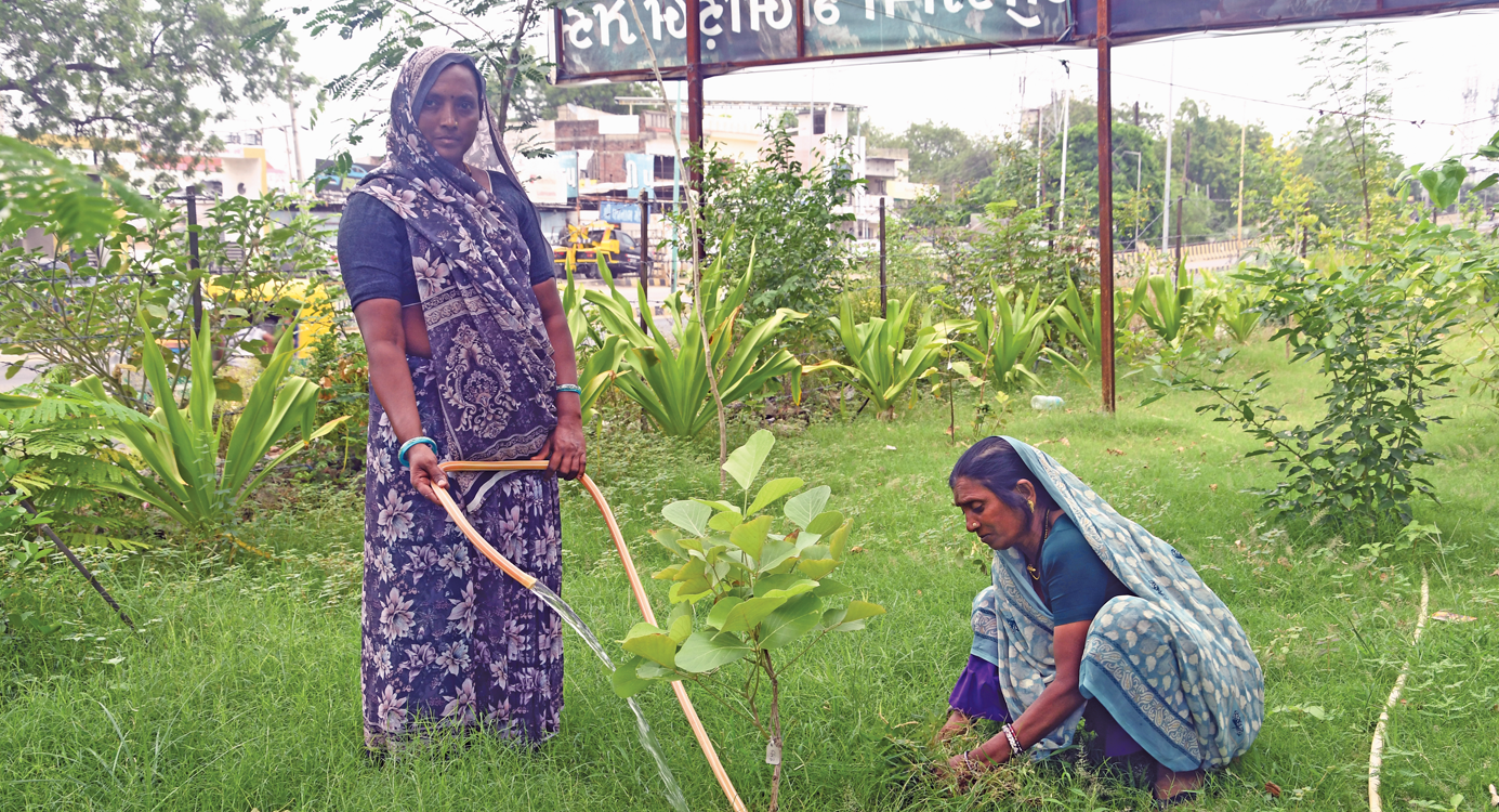 Residents of the Ramnagar II settlement in Patan tend to their Oxygen Park