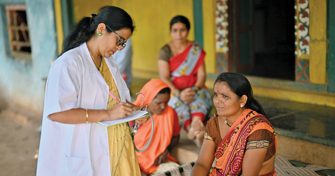 A healthcare worker conducting a community-based assessment in a village in Maharashtra