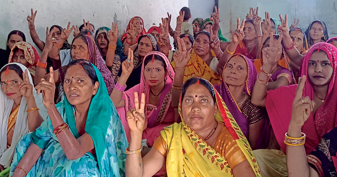 Anand Ranjana (background), a fellow in the programme, leads a community session on domestic violence in Buxar in Bihar