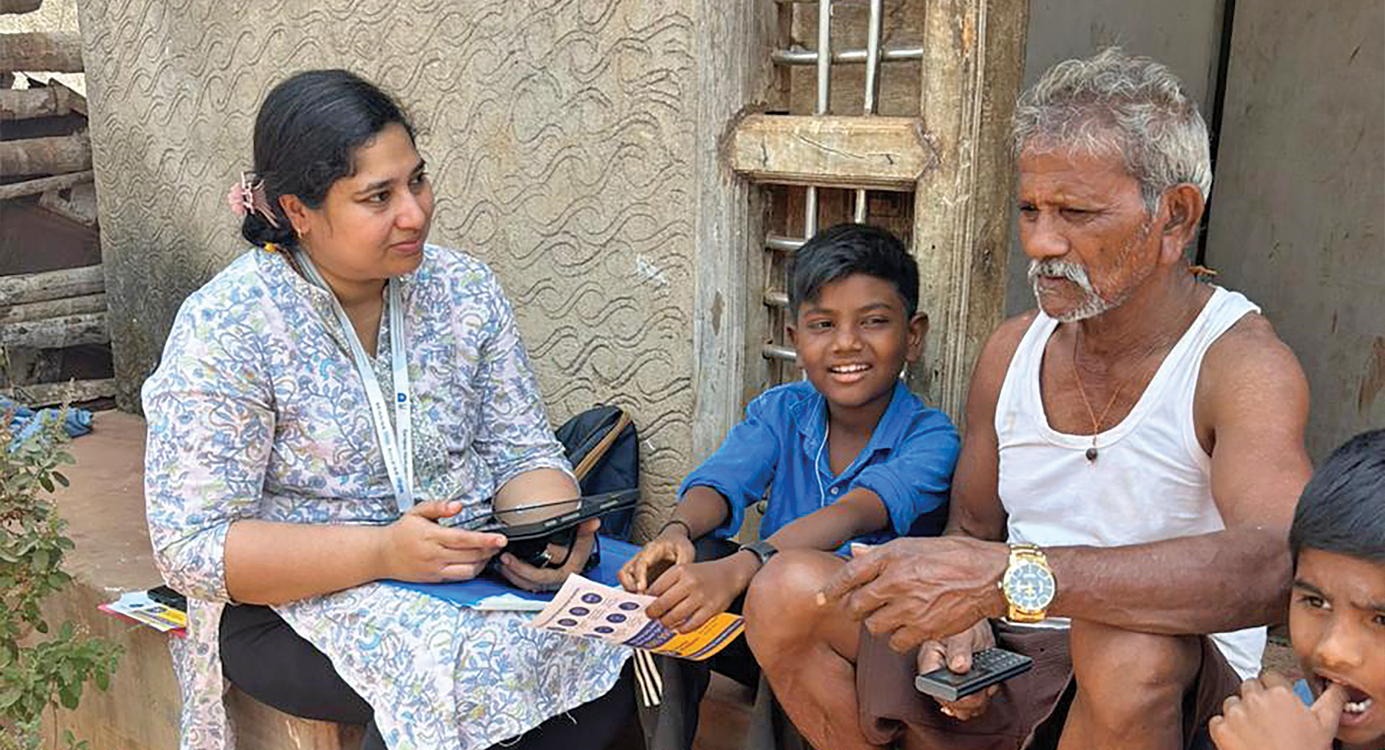 An enumerator during a survey of the elderly in Hodigere village in Karnataka’s Davanagere district
